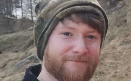 headshot of Joshua Clarke